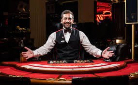 Mobile phone displaying Crazy Time game interface with bet slip and live croupier